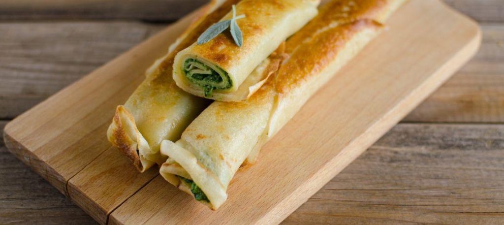 Panqueca de ricota com espinafre ao molho branco