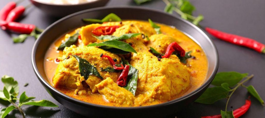 Peixe ao molho de coco e curry